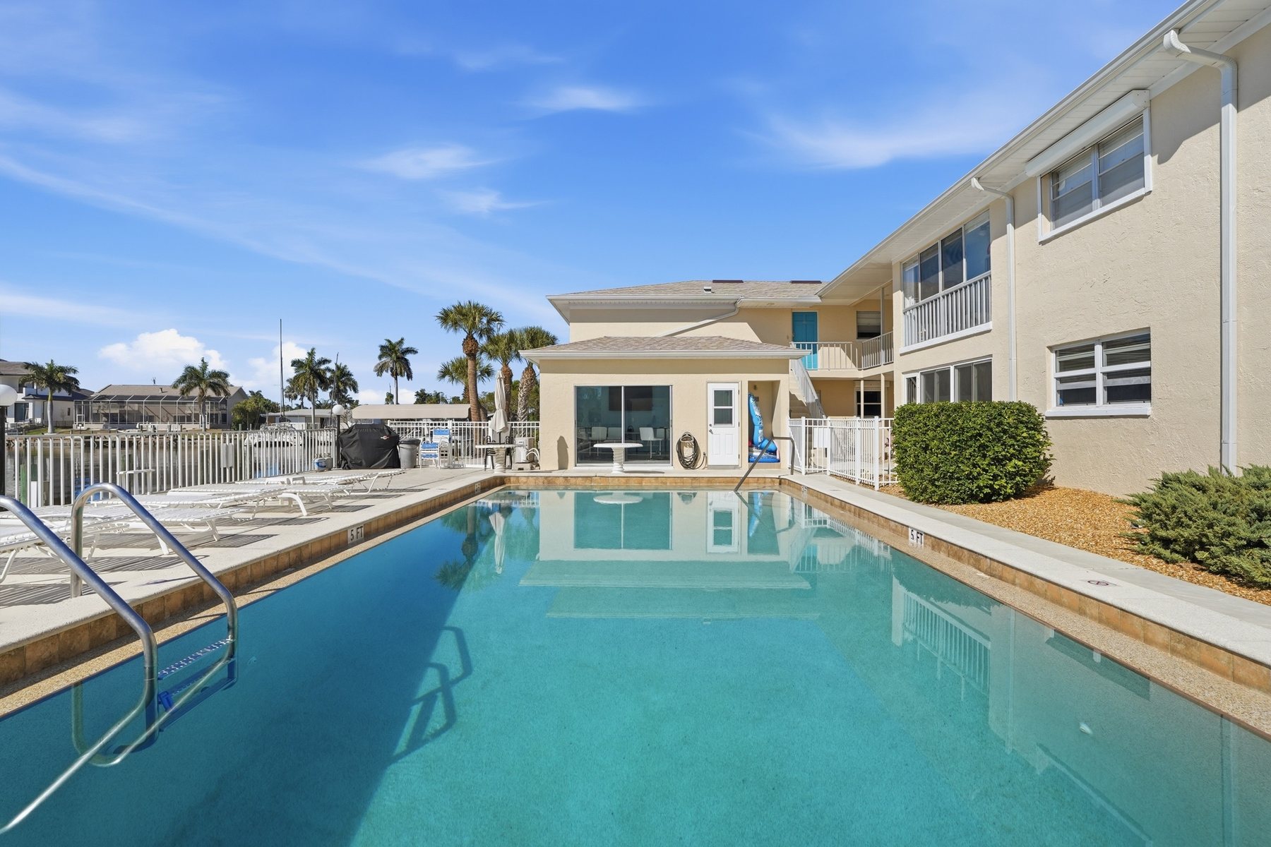 Community pool beside the Coral Cay condominium building, 1714 Bikini Ct